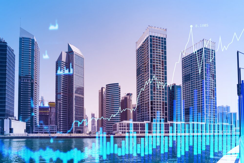 Dubai skyline with cranes over new residential towers, illustrating the Dubai property market outlook 2027
